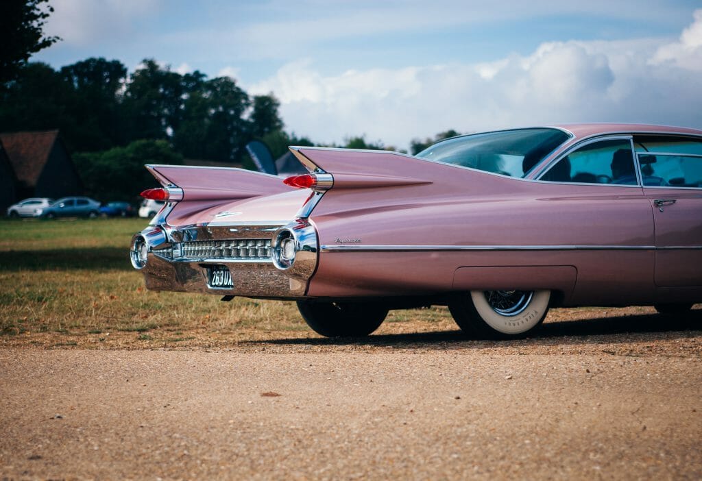 Pink car after being fixed through Monzi car repair loans