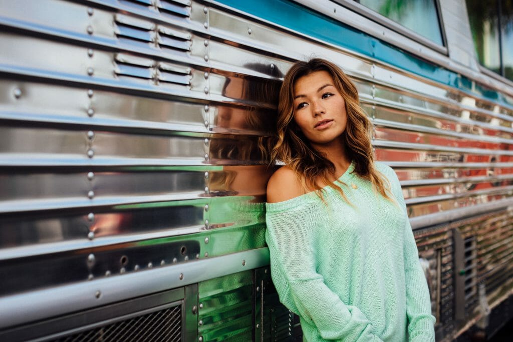 Women leans against bus relieved to avoid bad credit loans Australia guaranteed approval