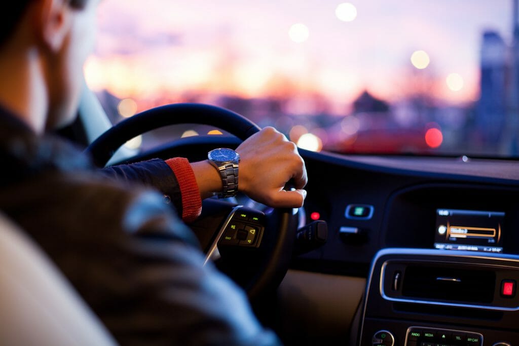 John driving in car repaired with personal loan