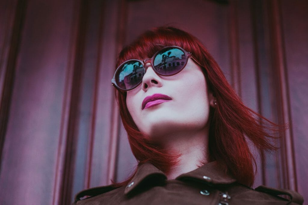 Woman in glasses waiting for instant cash loans approval